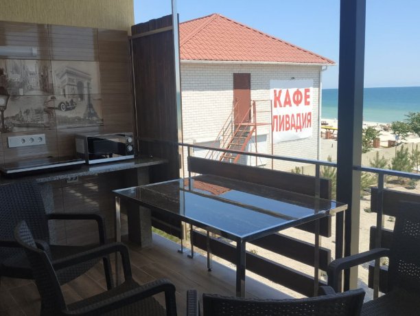 Люкс №4 (1 кот) двухкомнатный, база отдыха «Альфа», Кирилловка. Фото 2